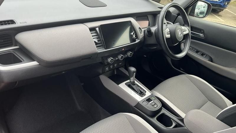 Used Honda Jazz Hybrid 109 HP (80 kW) 2023 Premium  crystal red Hatchback