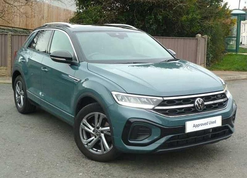 Used VW T-Roc R-line 150 HP (110 kW) 2023 Petrol blue black roof SUV