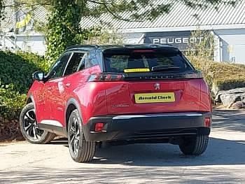 Second-hand Peugeot e-2008 GTi 100 kW (136 CP) 2023 Roșu SUV