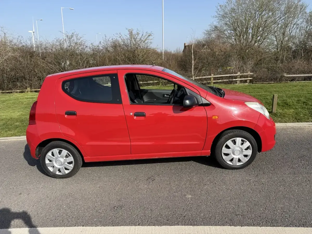 Used Suzuki Alto 68 HP (50 kW) 2014 Red Hatchback