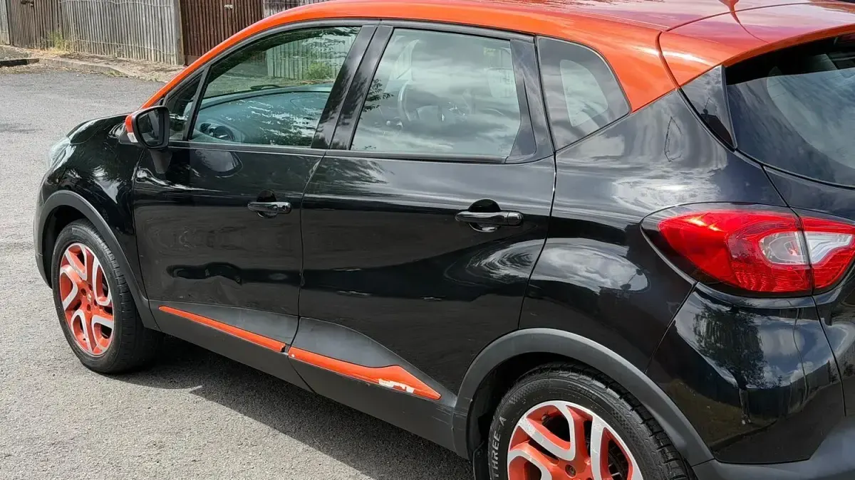 Used Renault Captur Dynamique 90 HP (66 kW) 2013 Black/orange SUV