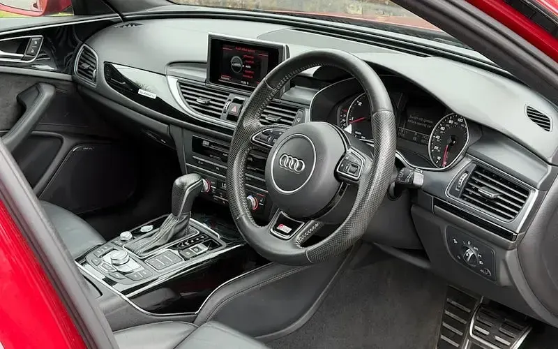 Used Audi A6 Black Edition 320 HP (235 kW) 2015 Red Estate