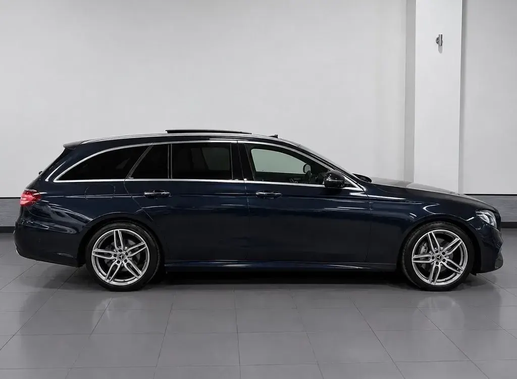 Used Mercedes E220 AMG Line Premium 194 HP (142 kW) 2019 Blue Estate