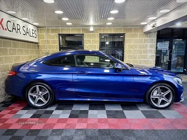 Used Mercedes C220 AMG line 170 HP (125 kW) 2018 Blue Coupe