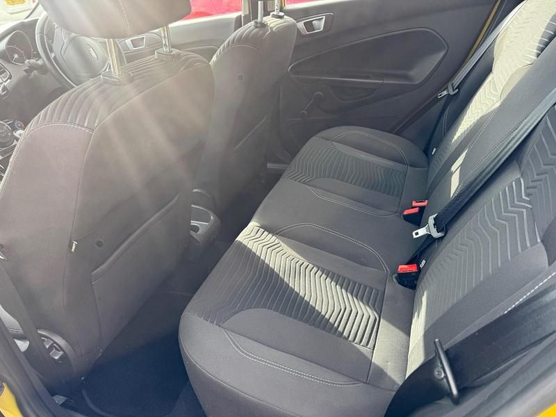 Used Ford Fiesta Zetec 75 HP (55 kW) 2013 Yellow Hatchback