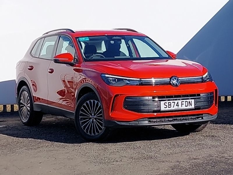 Metallic persimmon red New 2024 VW Tiguan Life SUV | £31,498 - Image 1/4