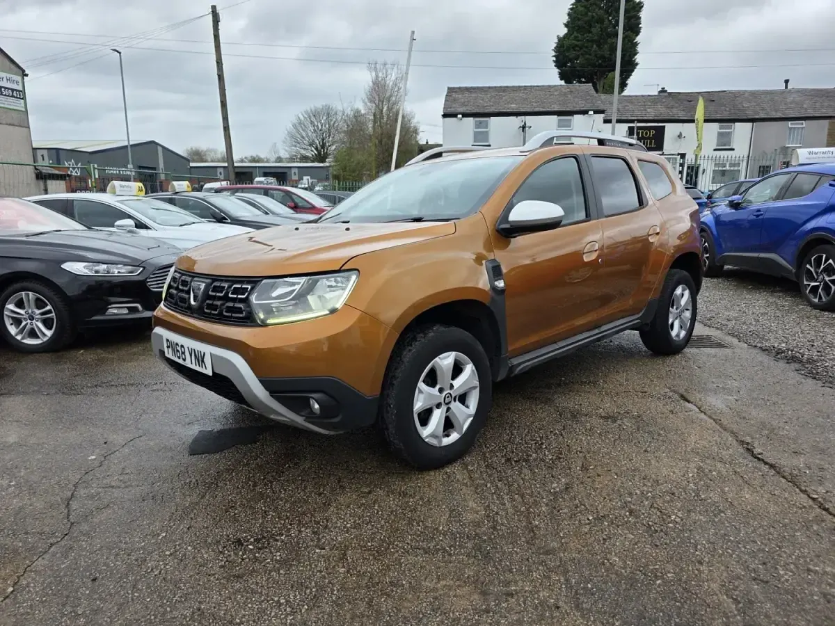 Second-hand Dacia Duster Comfort 114 CP (83 kW) 2018 Portocaliu SUV