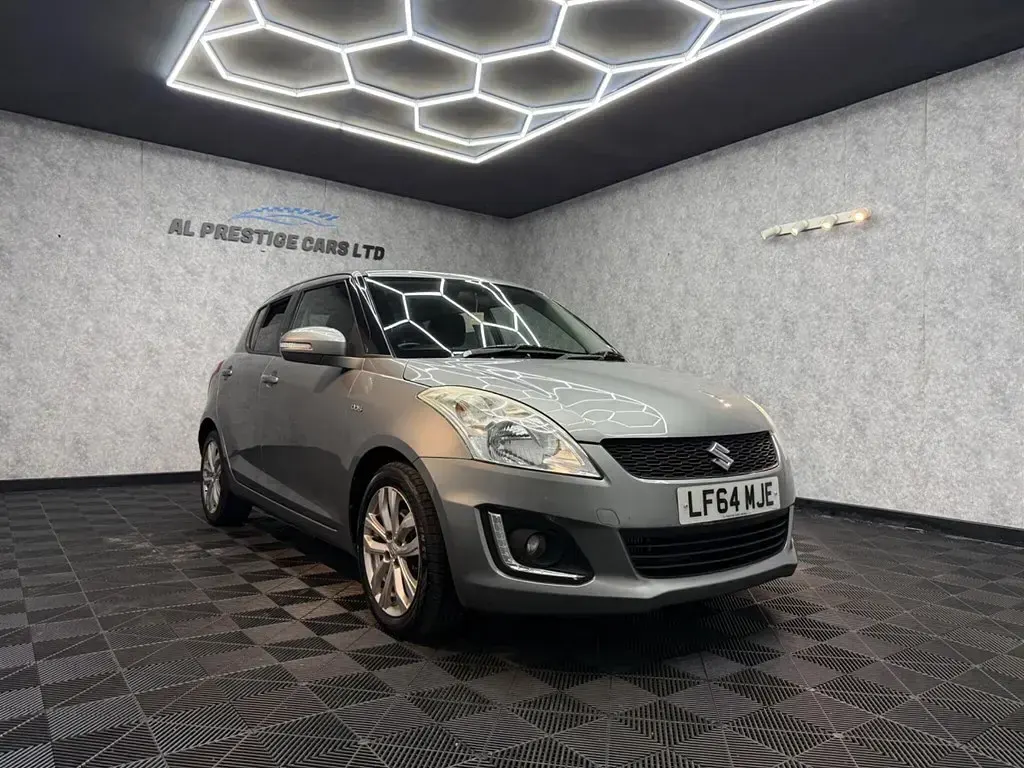 Usado Suzuki Swift SZ4 94 HP (69 kW) 2014 Cinzento Citadino
