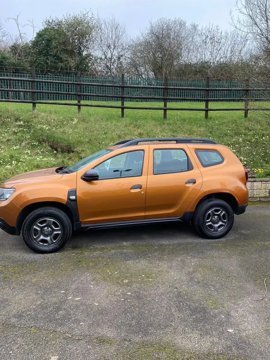 Used Dacia Duster Essentiel 90 HP (66 kW) 2021 Orange SUV