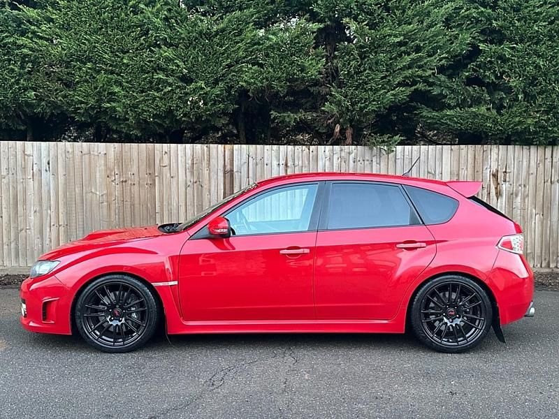 Used Subaru Impreza 2009 Red Hatchback