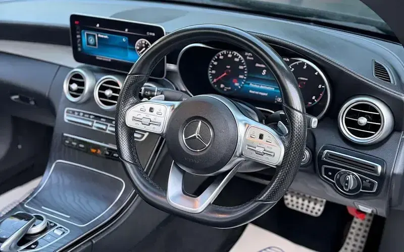 Used Mercedes C220 AMG Line Premium 194 HP (142 kW) 2019 Black Cabriolet