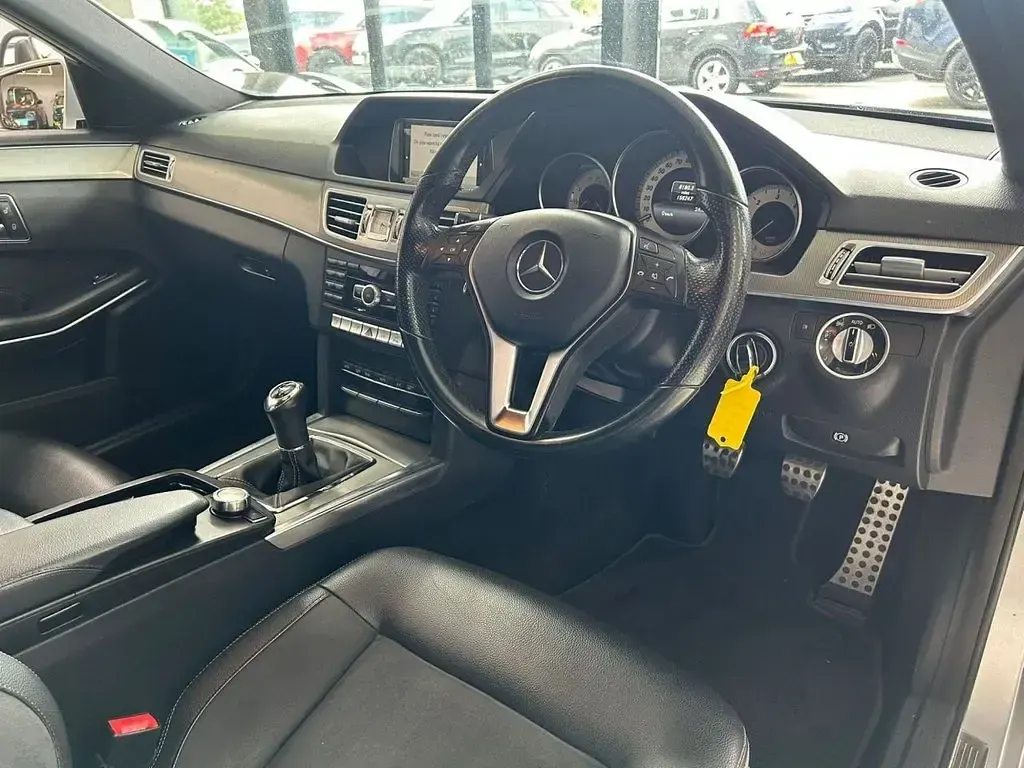 Used Mercedes E220 AMG 170 HP (125 kW) 2014 Silver Sedan