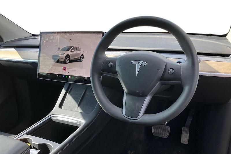 Used Tesla Model Y Long Range AWD 85 kW (116 HP) 2023 White SUV