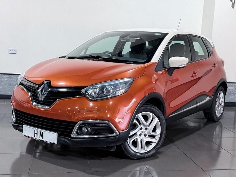 Used Renault Captur Dynamique 90 HP (66 kW) 2014 Orange/cream SUV