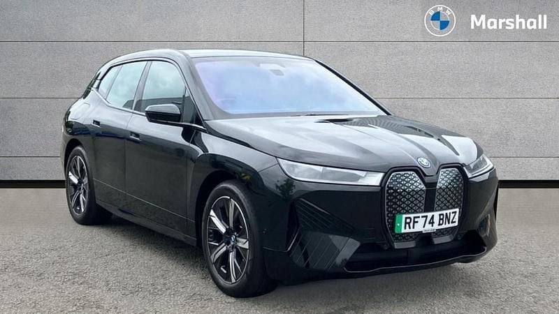 Black sapphire Used 2024 BMW iX M Sport SUV | £57,696 (A bit pricey) - Image 1/4