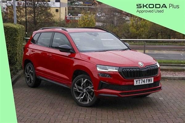Velvet red metallic Used 2024 Skoda Karoq SportLine SUV | £27,995 (Fair price) - Image 1/4