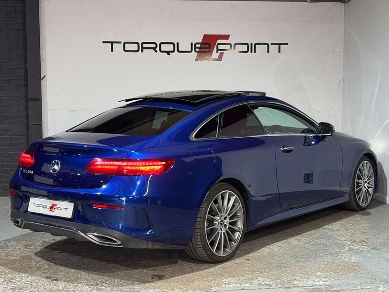 Used Mercedes E220 AMG line 194 HP (142 kW) 2019 Blue Coupe