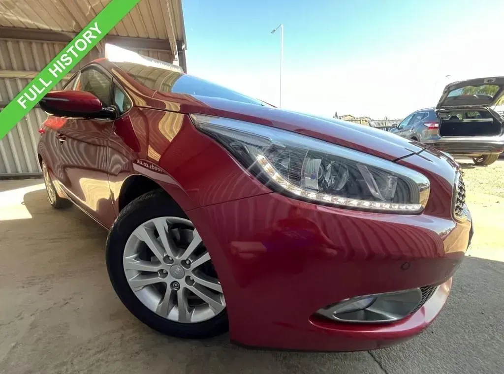 Używany Kia Ceed 126 KM (92 kW) 2014 Czerwony Hatchback
