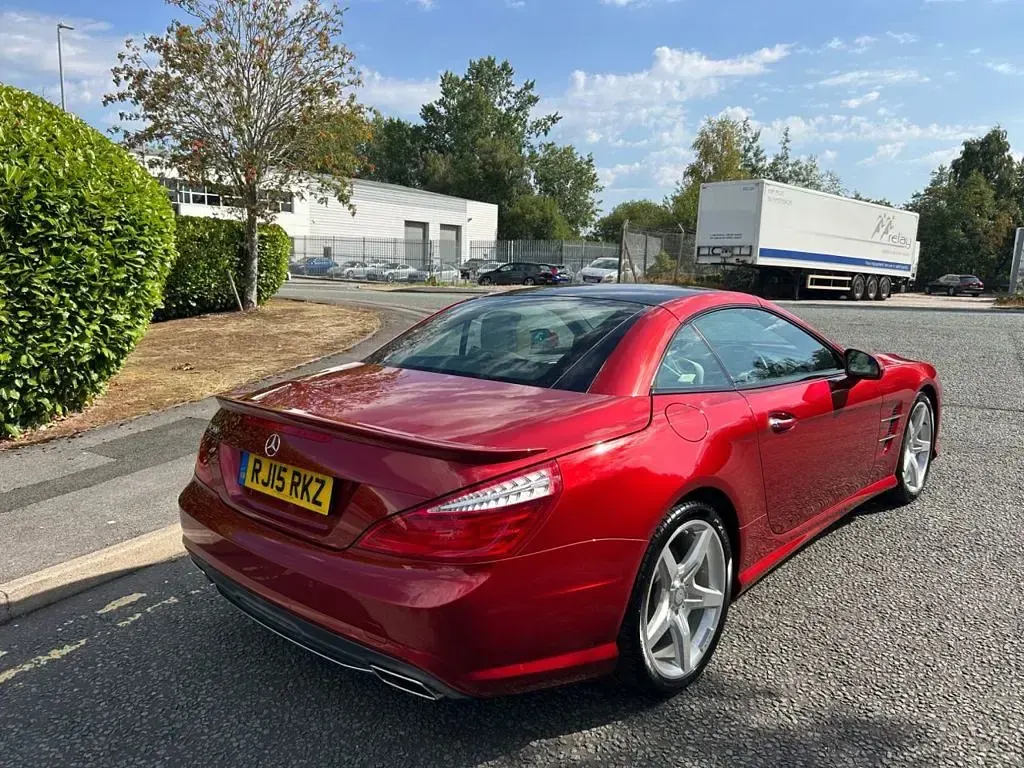 Used Mercedes SL500 AMG 448 HP (329 kW) 2015 Hyacinth red metallic Cabriolet