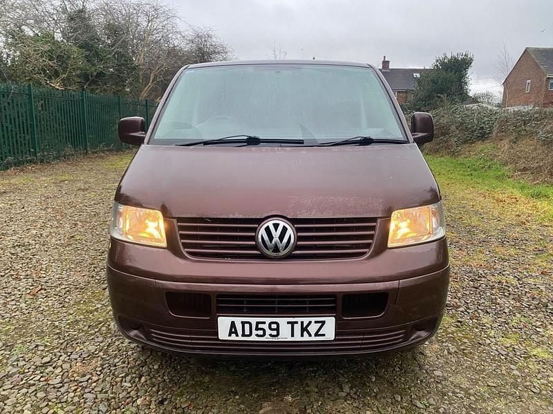 Used VW T5 102 HP (75 kW) 2009 Blackberry brown Van