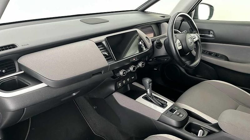 Used Honda Jazz Hybrid 109 HP (80 kW) 2021 Premium plus paint sunlight white Hatchback