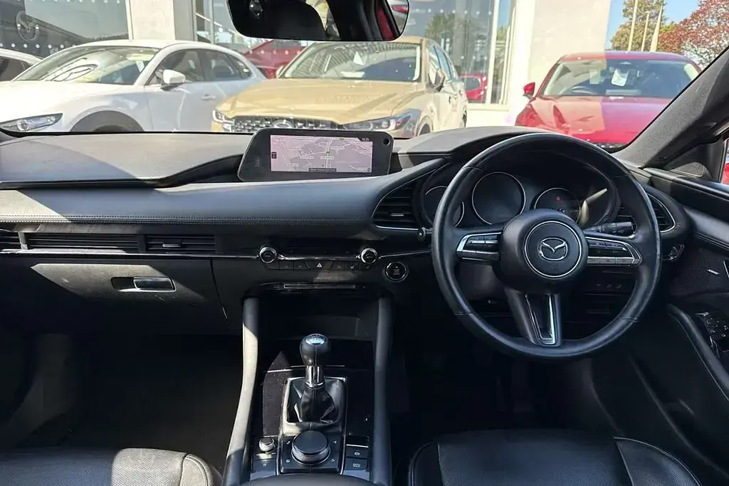 Używany Mazda 3 Inclusive 177 KM (130 kW) 2021 Czerwony Hatchback