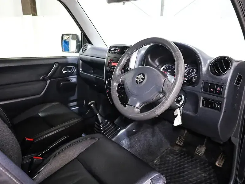 Used Suzuki Jimny SZ4 85 HP (62 kW) 2012 Black SUV