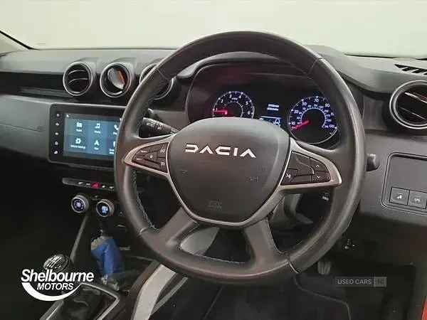 Used Dacia Duster Extreme 90 HP (66 kW) 2023 Orange SUV