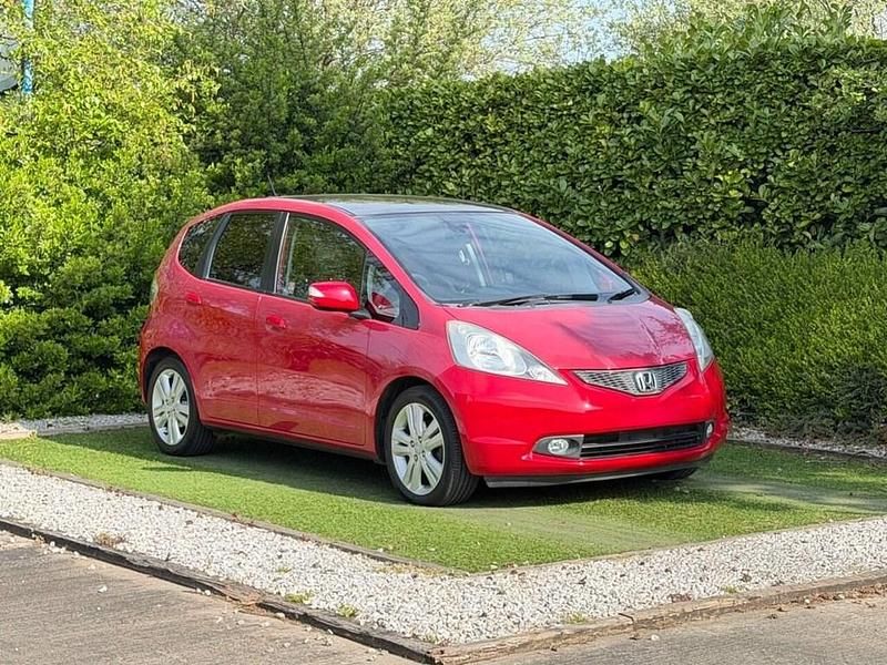 Begagnad Honda Jazz EX 100 HK (73 kW) 2009 Röd Halvkombi
