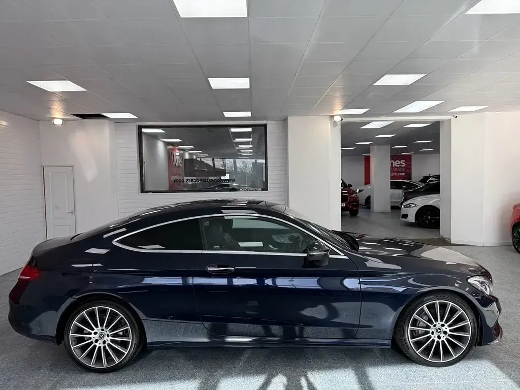 Used Mercedes C220 AMG line 170 HP (125 kW) 2017 Blue Coupe