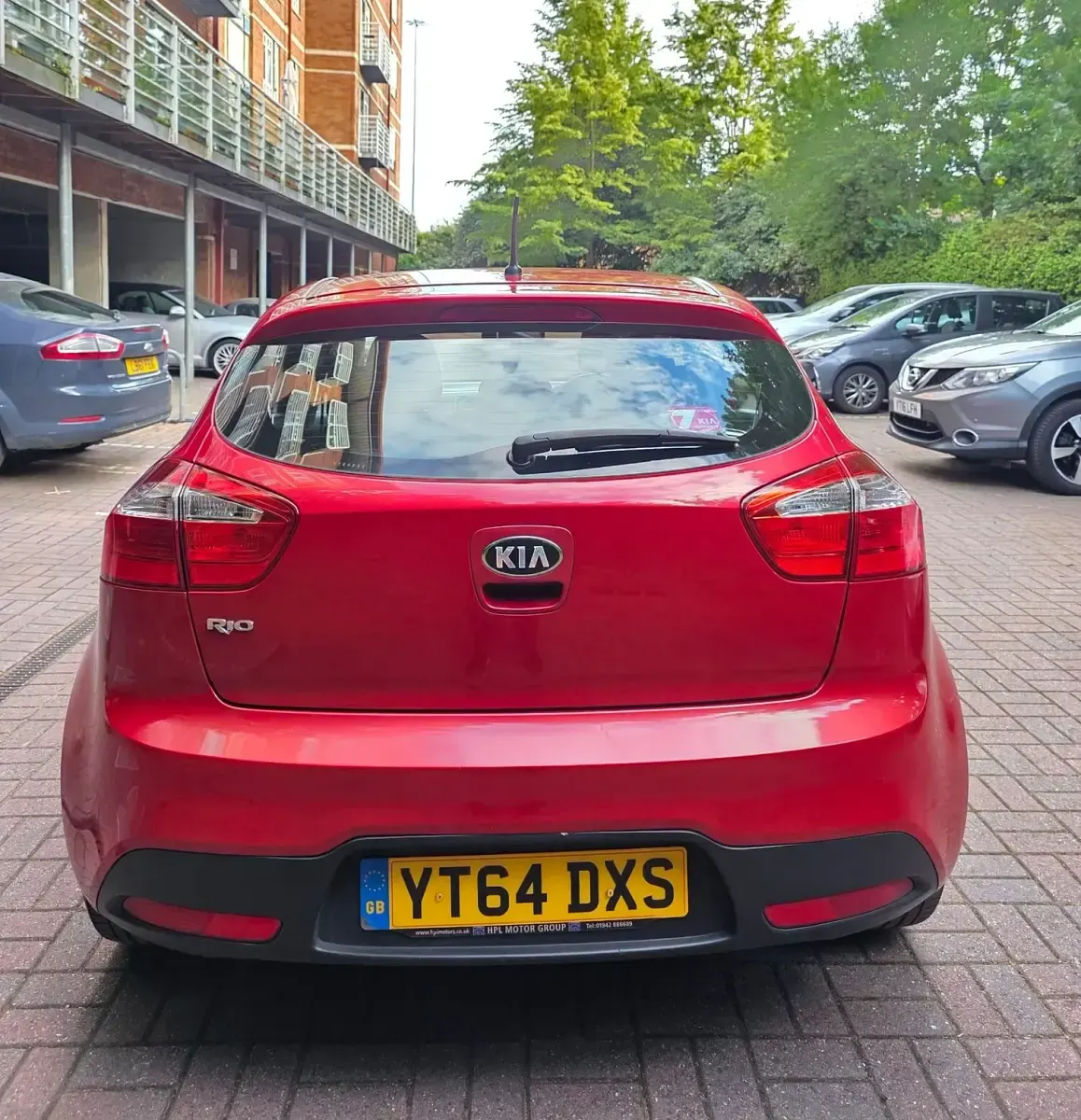 Used Kia Rio 84 HP (61 kW) 2014 Red Hatchback