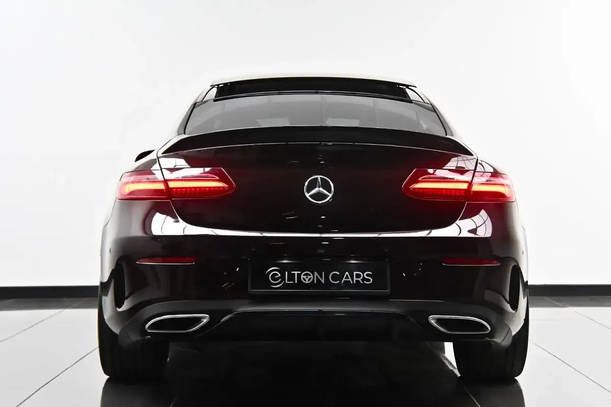 Used Mercedes E220 AMG Line Premium Plus 194 HP (142 kW) 2018 Red Coupe