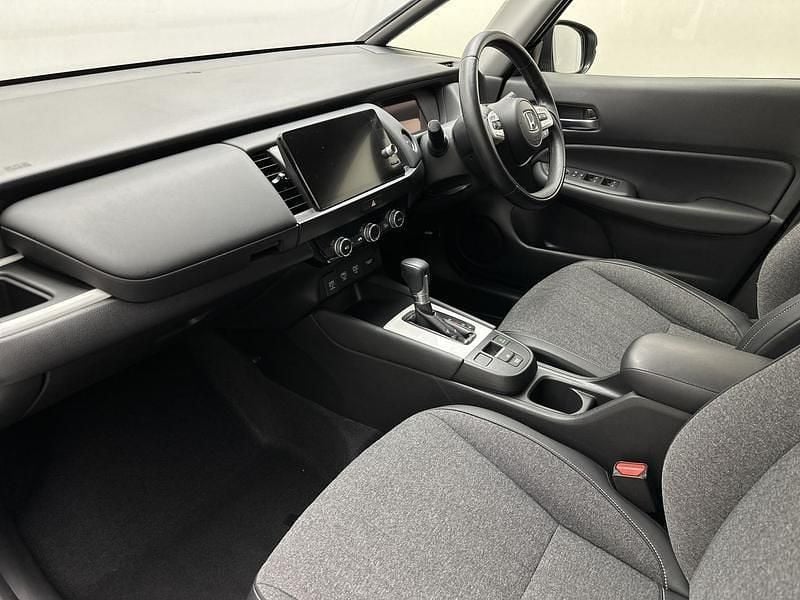 Used Honda Jazz Hybrid 109 HP (80 kW) 2021 Premium sunlight white Hatchback