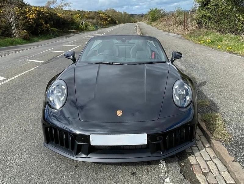 Ny Porsche 911 534 HK (392 kW) 2026 Svart Cab