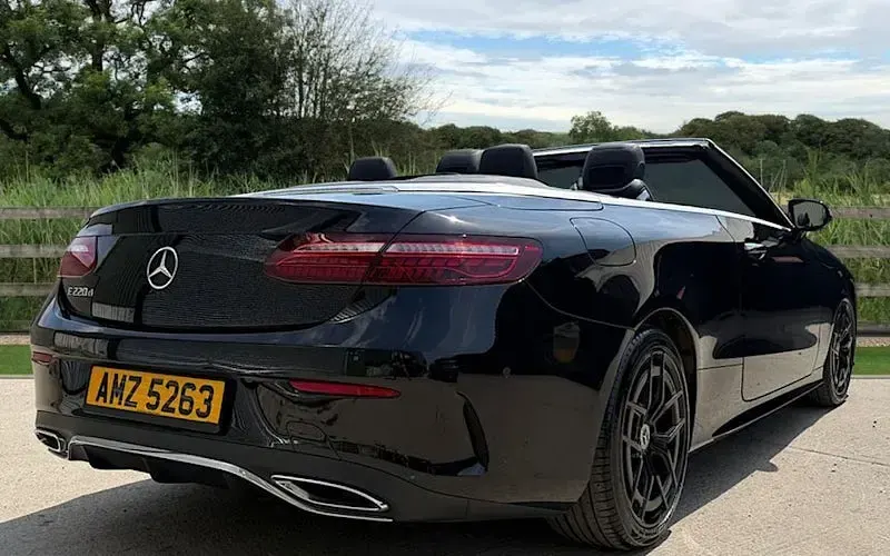 Used Mercedes E220 AMG Line Premium 194 HP (142 kW) 2021 Black Cabriolet