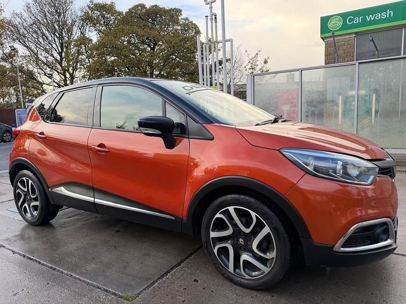 Used Renault Captur Dynamique 90 HP (66 kW) 2015 Orange/black SUV