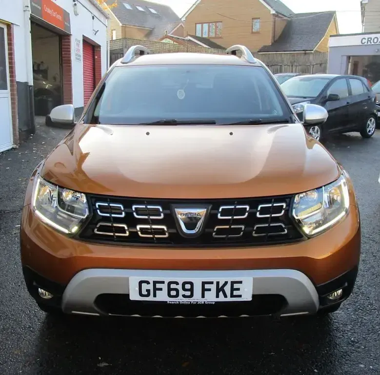 Second-hand Dacia Duster Comfort 130 CP (95 kW) 2019 Portocaliu SUV