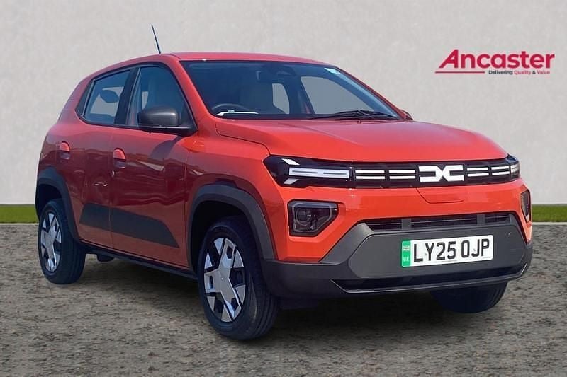 Brick red New 2025 Dacia Spring Expression Hatchback | £10,795 (Good price) - Image 1/4