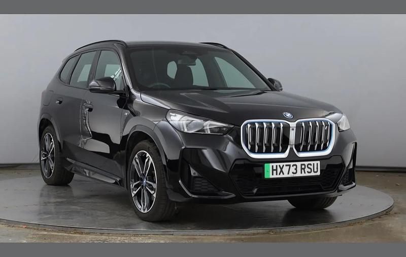 Black sapphire Used 2023 BMW iX1 M Sport SUV | £32,299 (Fair price) - Image 1/4