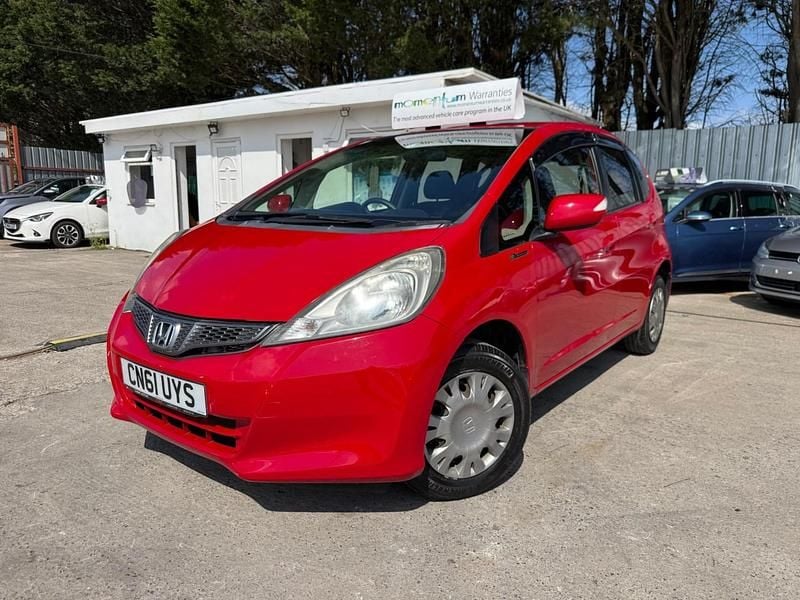 Begagnad Honda Jazz Hybrid 2011 Röd Halvkombi