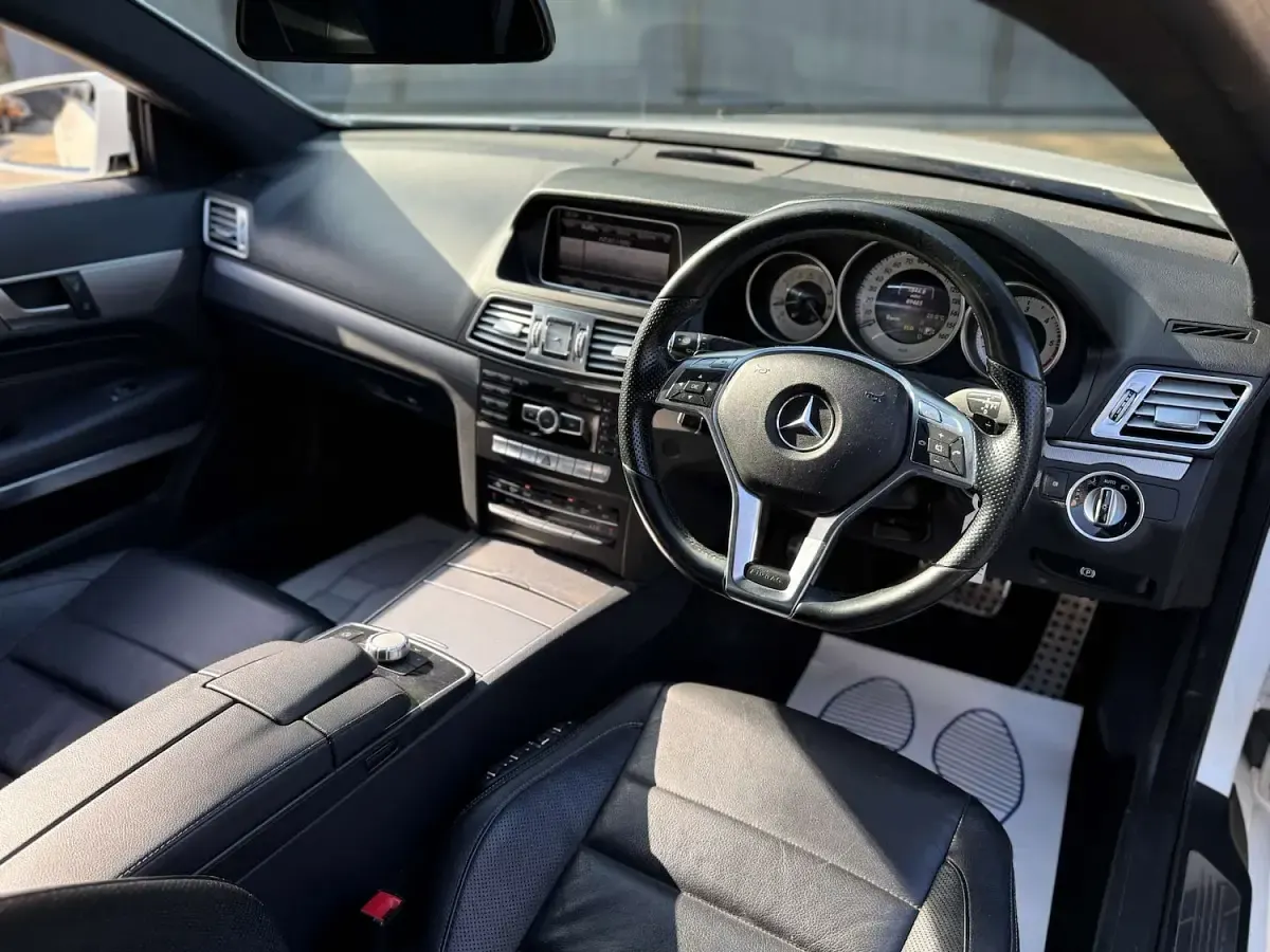 Usado Mercedes E220 AMG line 2014 Blanco Coupe