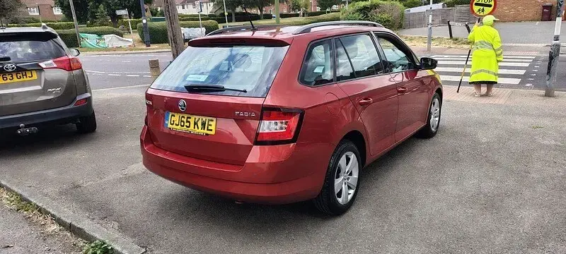 Used Skoda Fabia SE 90 HP (66 kW) 2015 Red Estate
