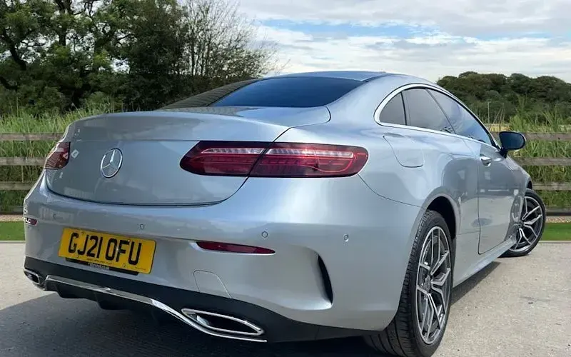 Used Mercedes E220 AMG line 194 HP (142 kW) 2021 Silver Coupe