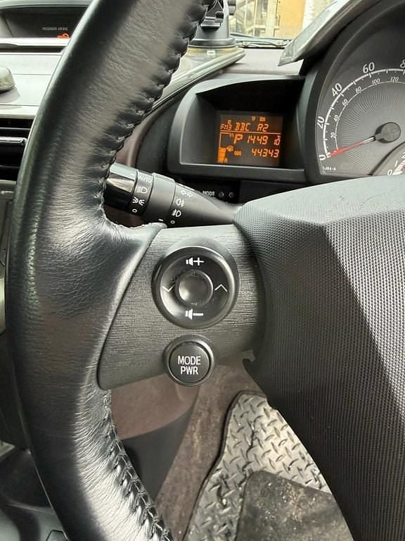 Used Toyota iQ 68 HP (50 kW) 2010 Silver Hatchback