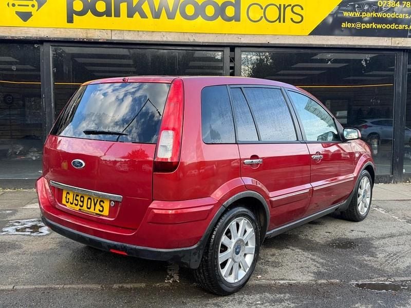 Used Ford Fusion Titanium 99 HP (72 kW) 2009 Red Hatchback