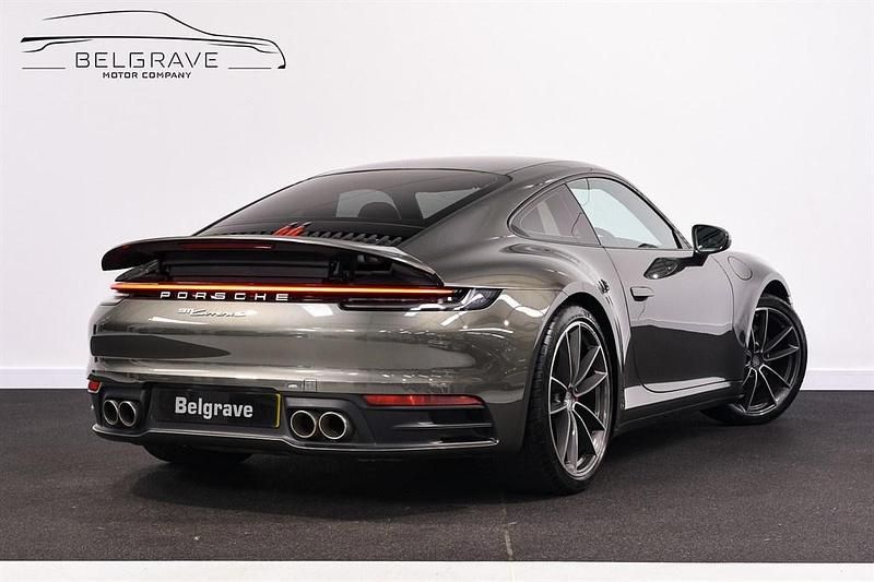 Used Porsche 911 Carrera S 450 HP (330 kW) 2023 Aventurine green metallic w/ black leather (crayon Coupe