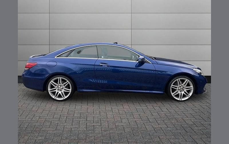 Used Mercedes E220 AMG line 174 HP (127 kW) 2016 Blue Coupe