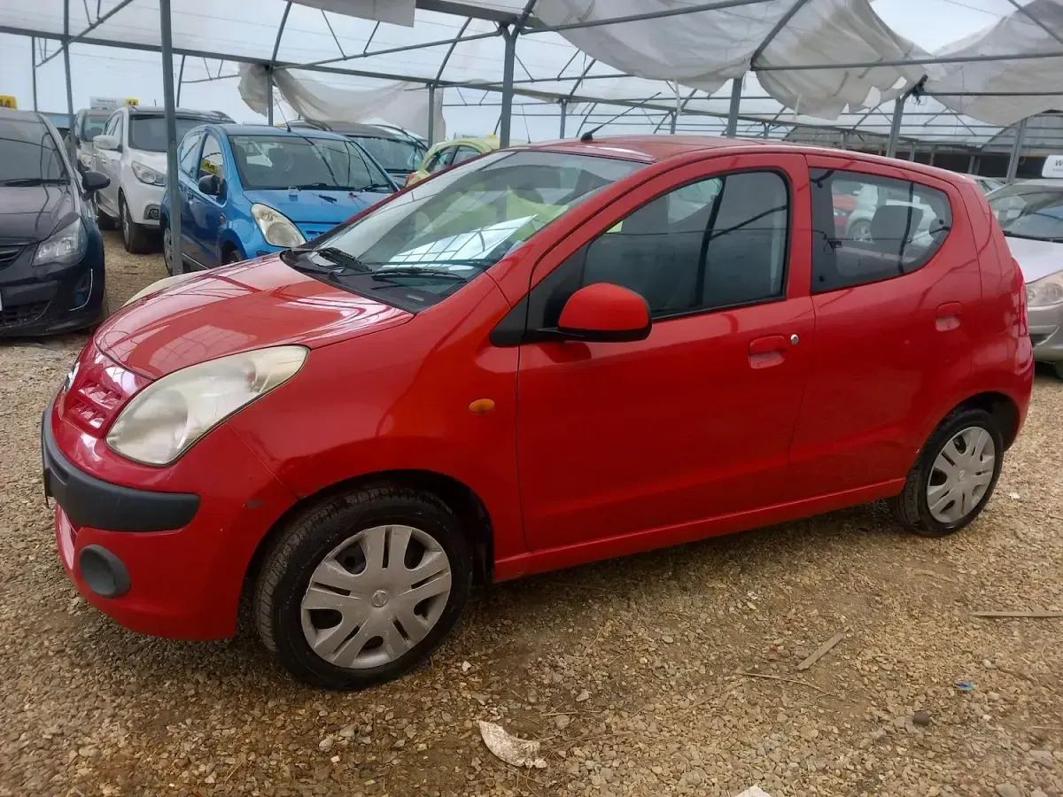Used Nissan Pixo N-TEC 68 HP (50 kW) 2010 Red Hatchback