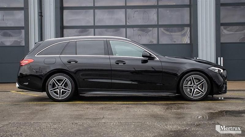 Used Mercedes C300 AMG line 265 HP (194 kW) 2023 Black Estate