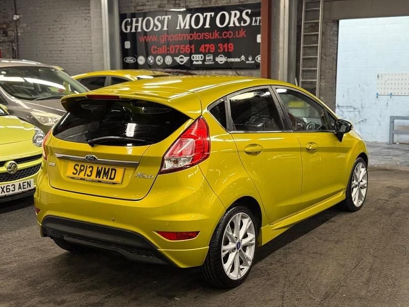 Used Ford Fiesta Titanium 75 HP (55 kW) 2013 Yellow Hatchback